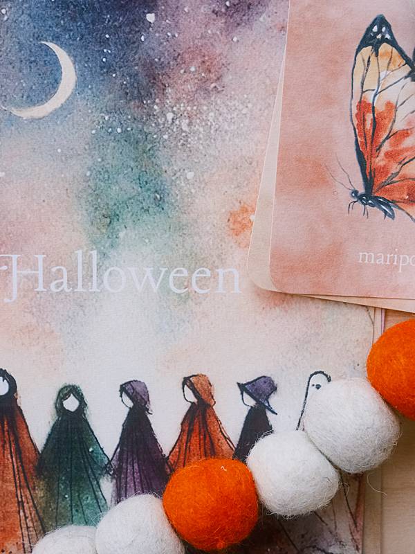 The cover page and bilingual vocabulary cards from Acorn School's Halloween Curriculum.