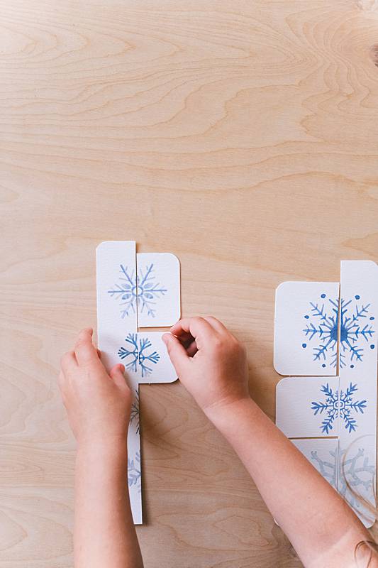 A snowflake matching activity from Acorn School's Jack Frost Curriculum.