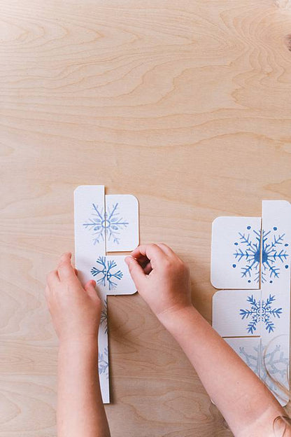 A snowflake matching activity from Acorn School's Jack Frost Curriculum.