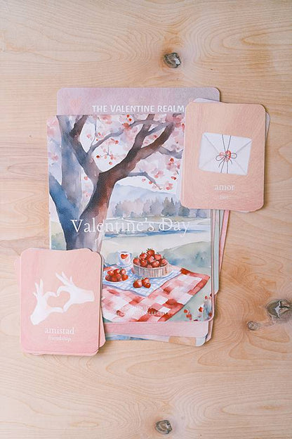 Image of cards stacked on a table with a painting of a tree