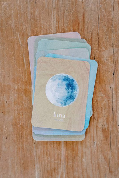 Stack of cards with pictures of a moon