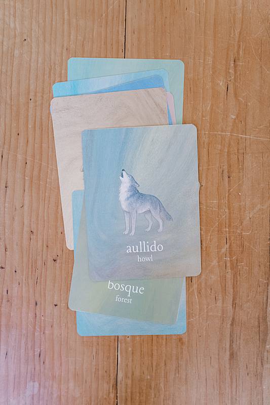 small cards stacked on a wooden table
