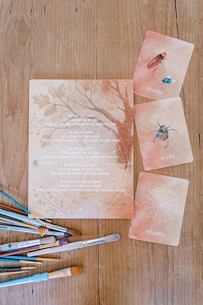 Cards and paint brushes on a table