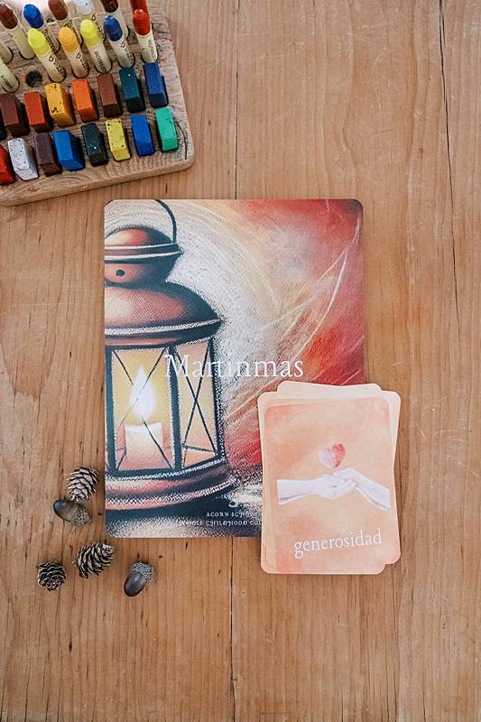 Big and small cards with crayons on a table.