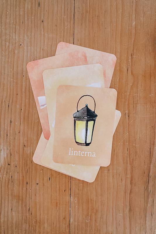 Cards with lantern illustration on a table
