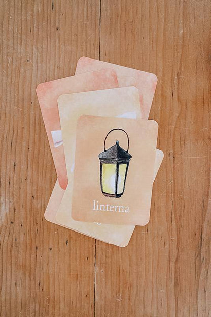 Cards with lantern illustration on a table