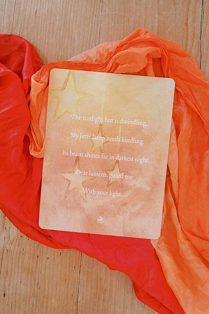Cards on an orange silk