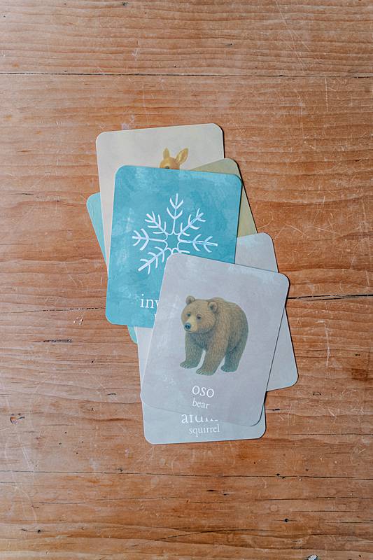 small card pile with a bear and snowflake illustration