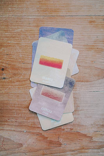 pile of small cards on a table