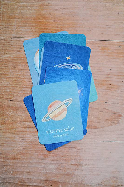 Pile of cards with planet illustrations