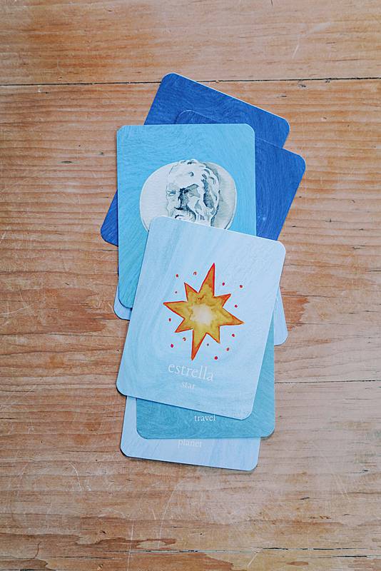 stack of cards with star illustrations
