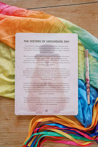 Paper on a rainbow colored fabric