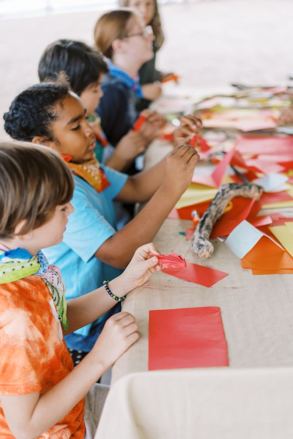 Acorn School kids doing a Waldorf craft in one of our classes.